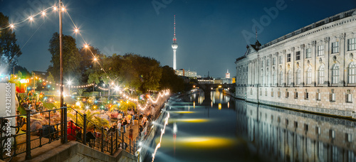 Berlin Strandbar party at Spree river with TV tower at night, Germany