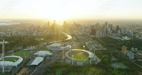 Aerial sunset view Melbourne Cricket Ground and cityscape