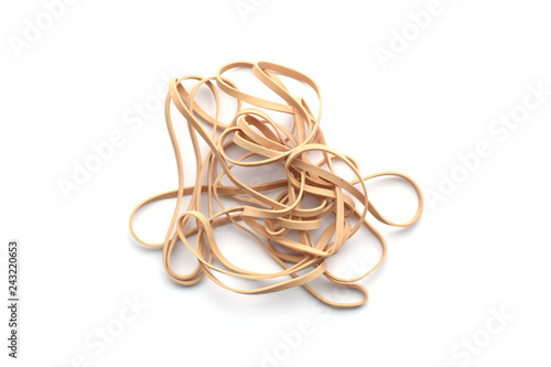 Pile of beige stretchy rubber bands
