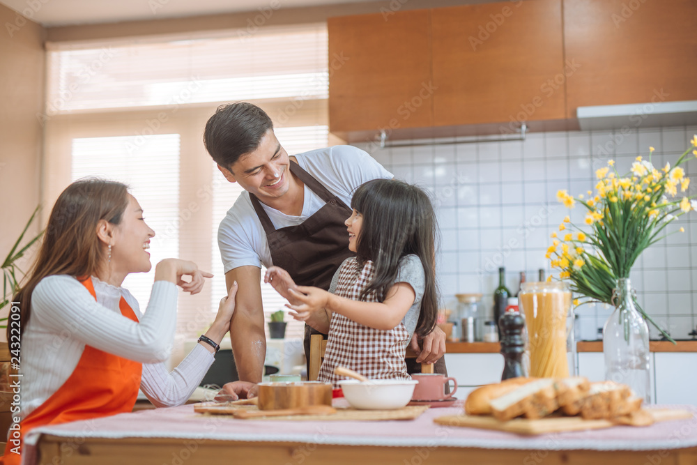 Daughter help parent preparing the bake Family concept. Daughter help parent preparing the bake Family concept.