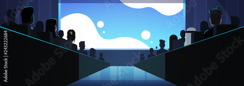 people group sitting cinema rows back rear view mix race crowd watching movie premiere on screen dark hall background flat horizontal banner vector illustration