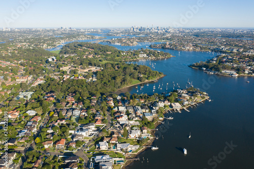 Aerial view of the Parramatta river and the Sydney city skyline to the east. photo