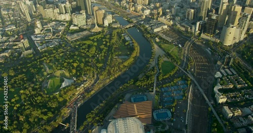 Aerial view at sunrise Melbourne Park and cityscape photo