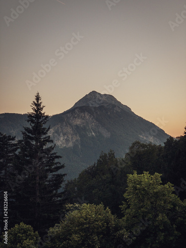 Scenic view of mountain against clear sky during sunset