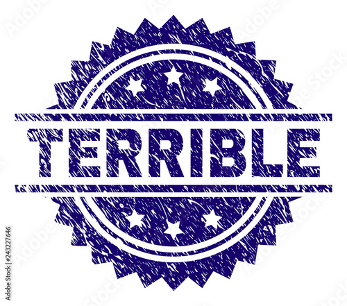 TERRIBLE stamp seal watermark with distress style. Blue vector rubber print of TERRIBLE text with dirty texture.
