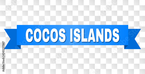 COCOS ISLANDS text on a ribbon. Designed with white caption and blue stripe. Vector banner with COCOS ISLANDS tag on a transparent background.