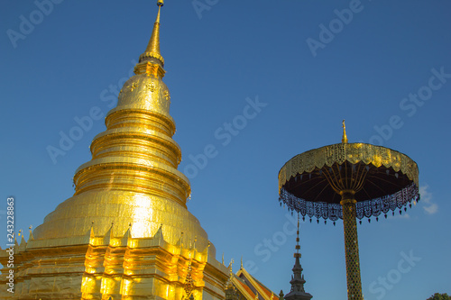 Wallpaper Mural Golden pagoda and the golden umbrella with blue sky background. Torontodigital.ca