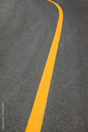 Yellow line on the asphalt road © junrong