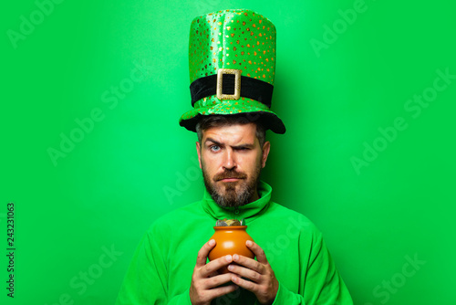 Happy St Patricks Day concept with pot of gold. Pot with money for St. Patrick's Day. Patricks Day Pot of Gold and shamrocks. photo
