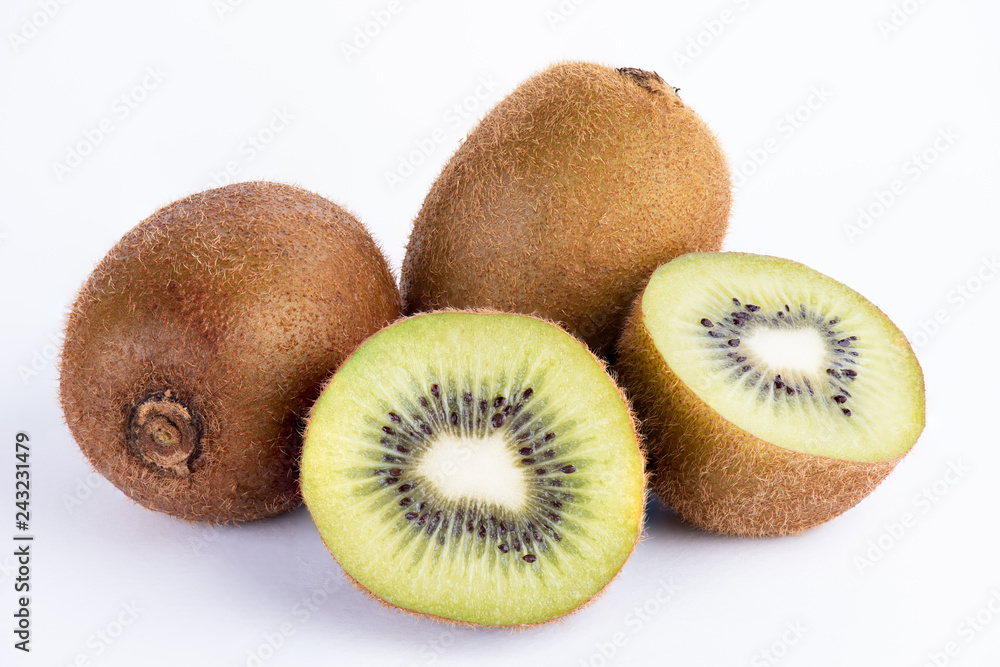 Kiwi fruit whole and half on white background. Kiwi fruit whole and half on white background.