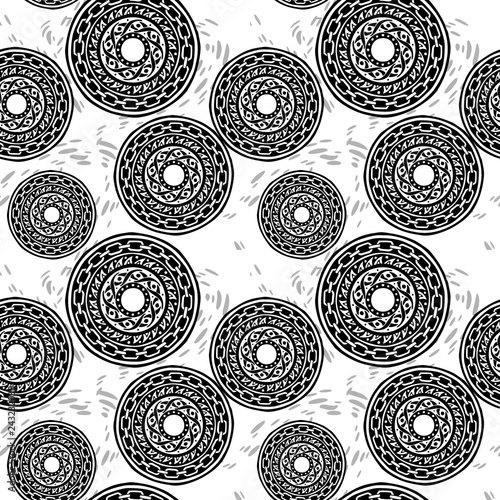motif black and white barbaric circle wheel tribal chain tattoo seamless pattern vector background