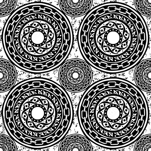 motif black and white barbaric circle wheel tribal chain tattoo seamless pattern vector background