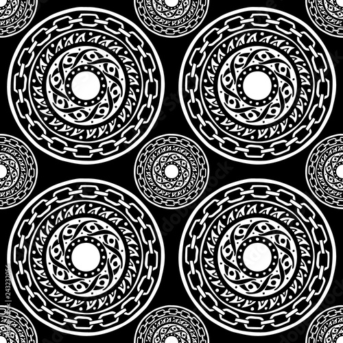 motif black and white barbaric circle wheel tribal chain tattoo seamless pattern vector background