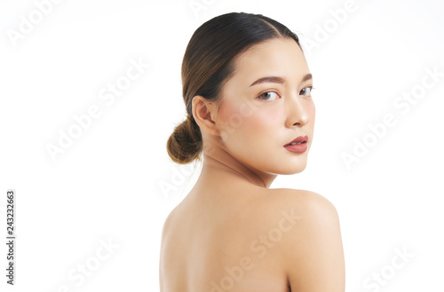 Beautiful Young Woman with Clean Fresh Skin. Face care . Facial treatment . Cosmetology , beauty and spa. Asian women portrait .