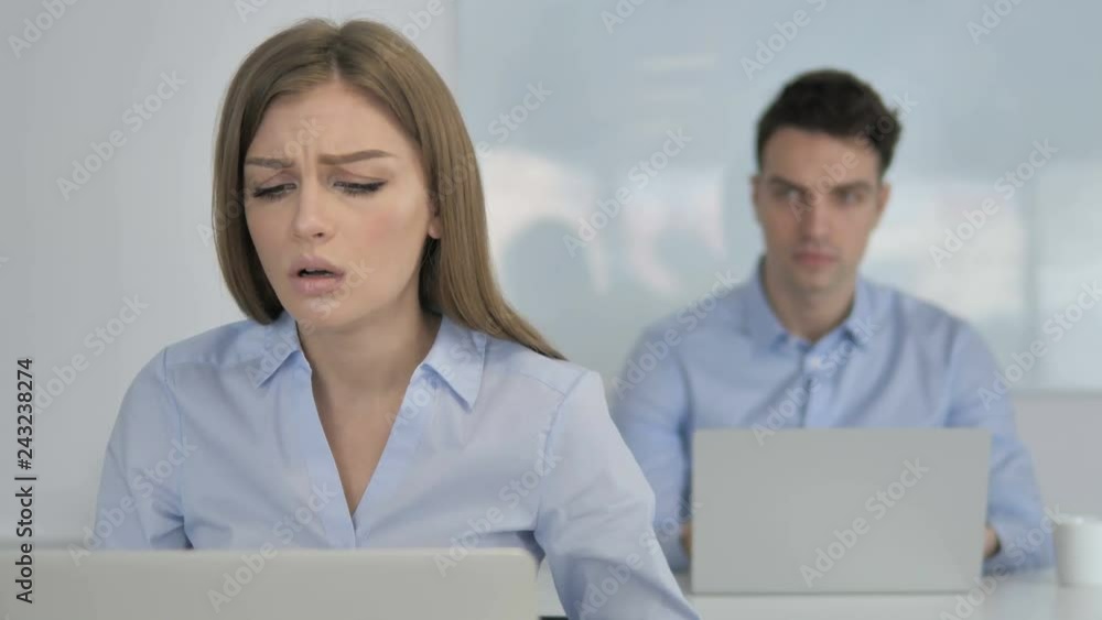 Young Businesswoman Upset by Financial Loss at Work Young Businesswoman Upset by Financial Loss at Work