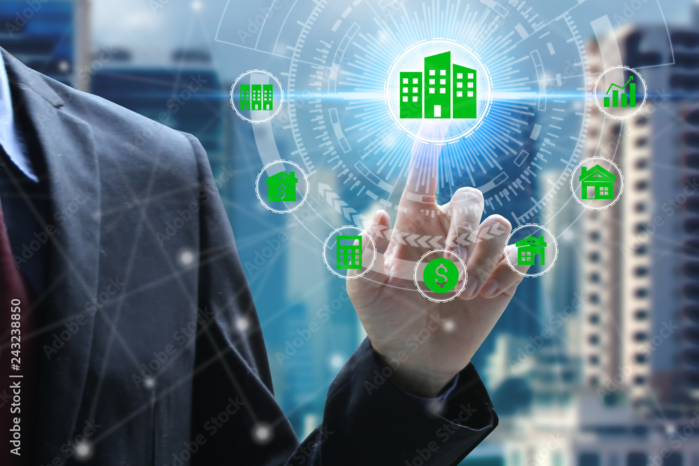 Finger touch with property investment icons over the Network connection Finger touch with property investment icons over the Network connection