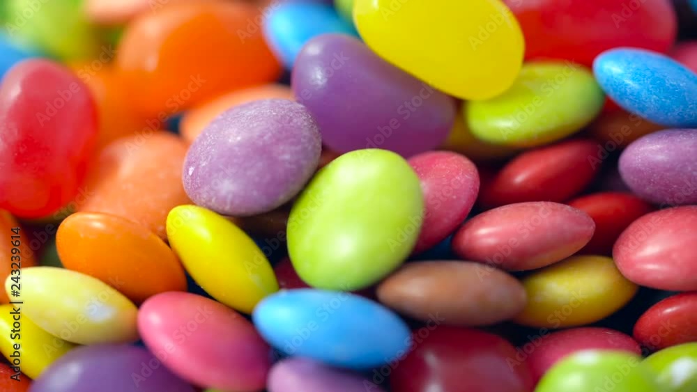 Macro closeup of multi color candy and jellies, dolly shot. Macro closeup of multi color candy and jellies, dolly shot.