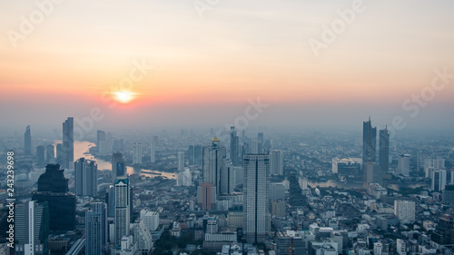 Cityscape sunset view skyline with buildings in business city in Bangkok, Thailand