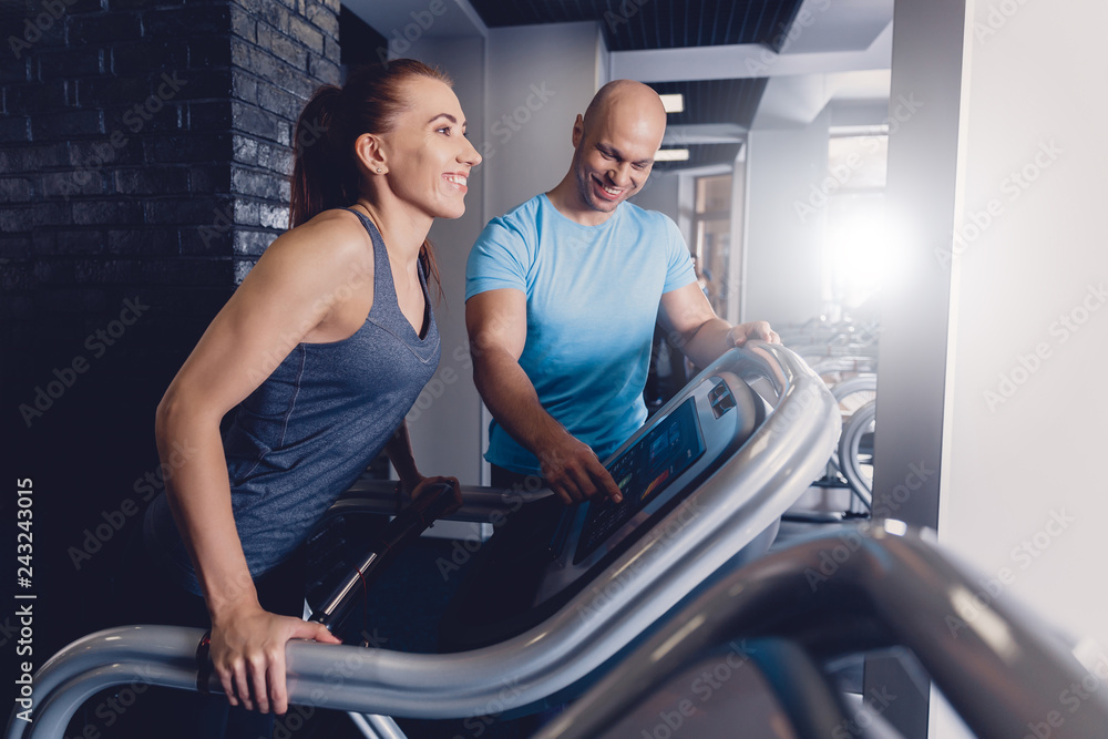 Personal training with a trainer on a treadmill Personal training with a trainer on a treadmill