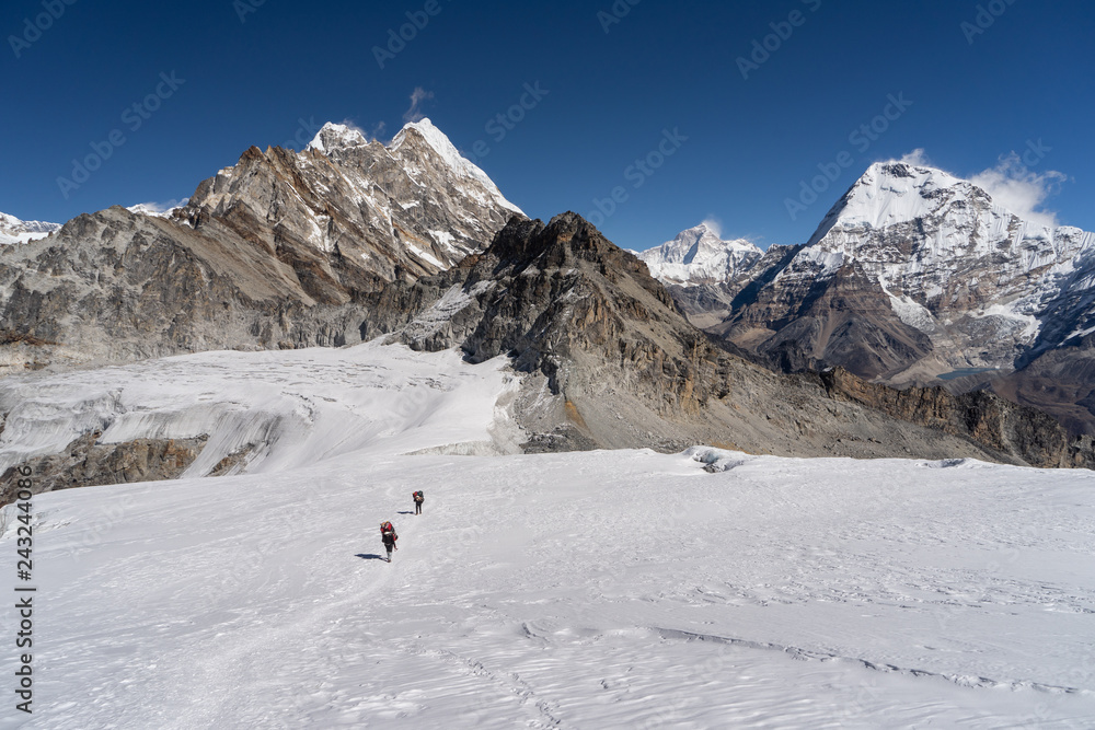 Trail from Mera peak base camp to Mera peak high camp walk on glacier, Khumbu region Himalayas mountain, Nepal Trail from Mera peak base camp to Mera peak high camp walk on glacier, Khumbu region Himalayas mountain, Nepal
