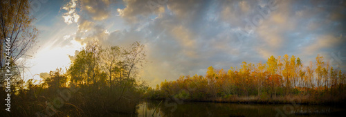 Sunset panorama of a lake just off of Louisiana's Lake Pontchartrain in Laplace.  photo