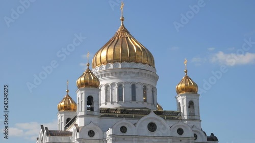 Fragment of white Christ the Saviour Cathedral with golden domes in Moscow, Russia