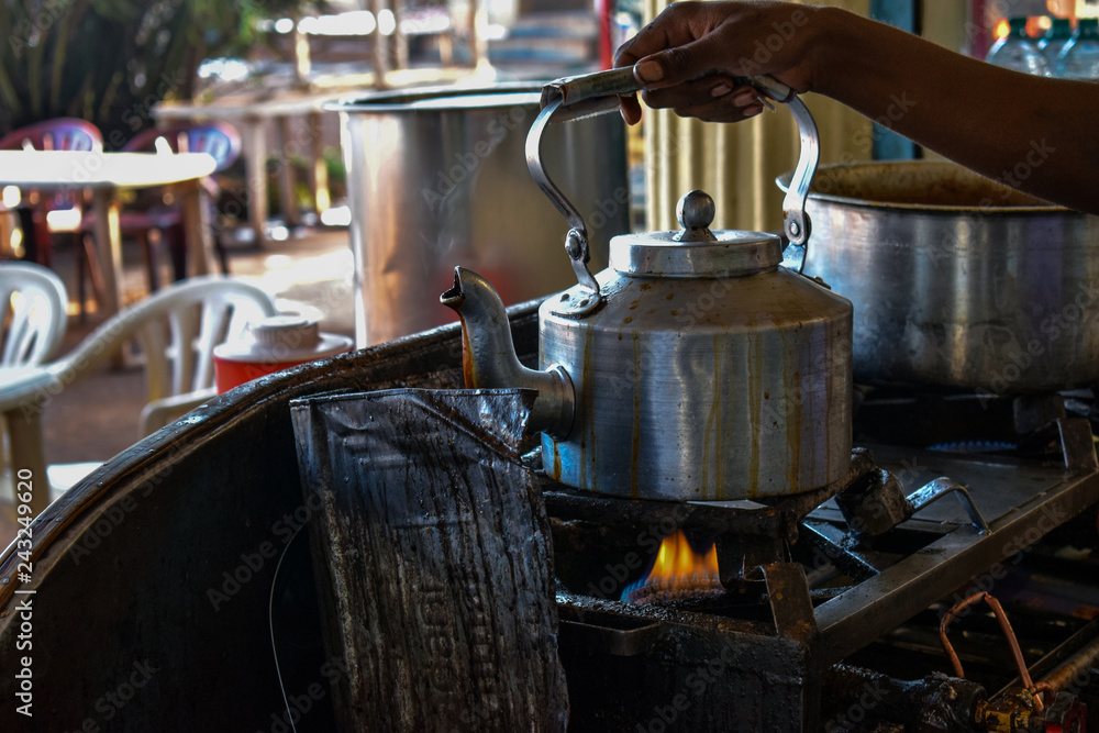 India traditional team making utensil which is made up of metal India traditional team making utensil which is made up of metal