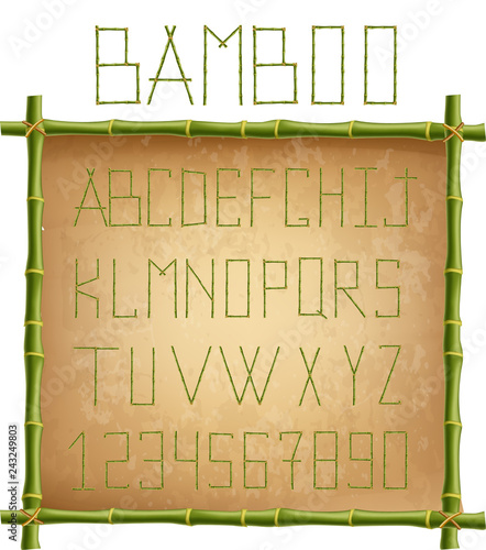 Green bamboo alphabet inside of wooden stick frame on old paper background.