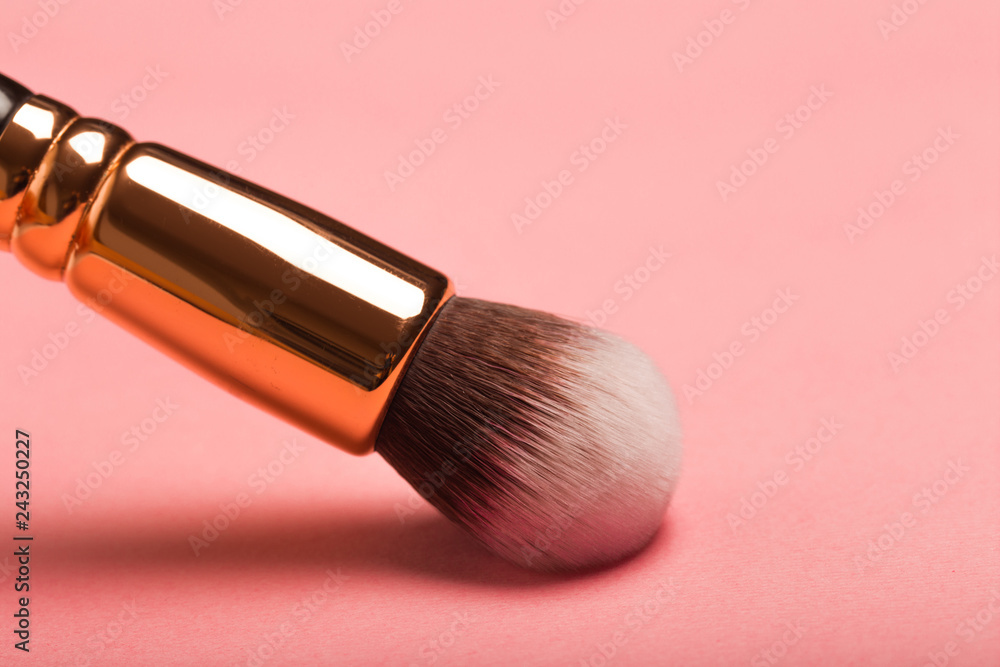 make up brush foundation blusher on pink background make up brush foundation blusher on pink background
