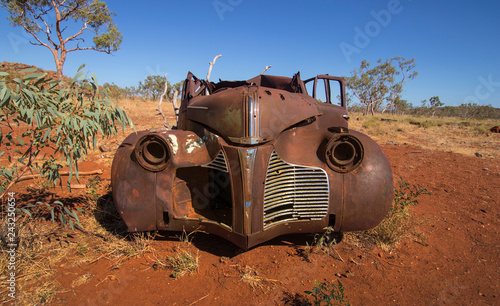Rusty car in outback Australia photo