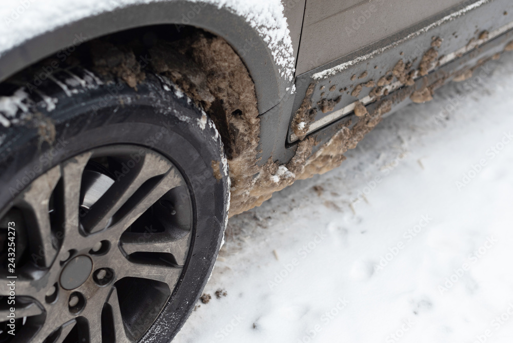 dirty car wheels in winter