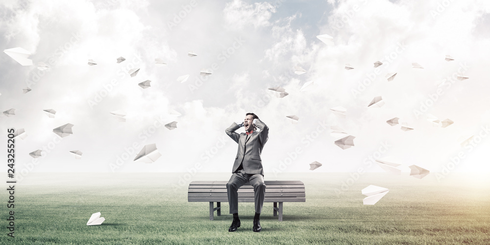 Young man in suit in park dont want to hear anything Young man in suit in park dont want to hear anything
