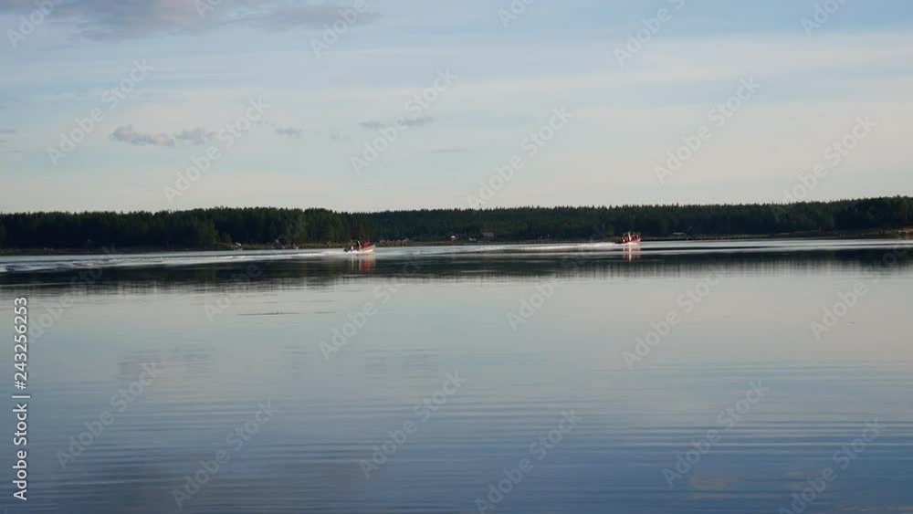 Speedboats Sail One After Another In The Summer By The Sea Speedboats Sail One After Another In The Summer By The Sea