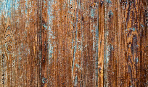 Old wooden background with blue rippled paint. vintage wood texture.