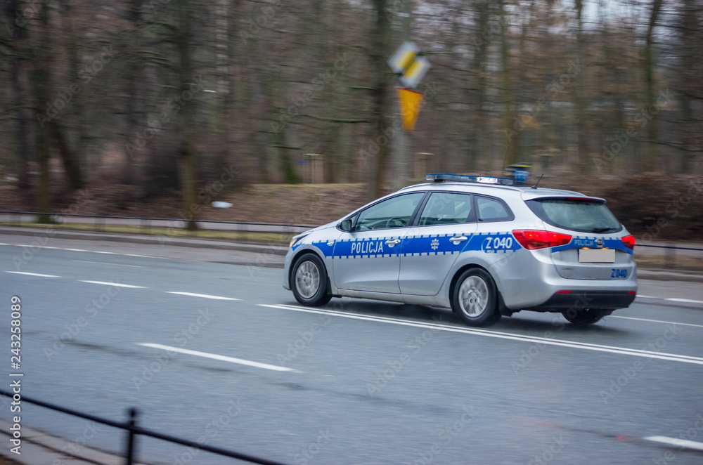 Police car travelling on the road at high speed Police car travelling on the road at high speed