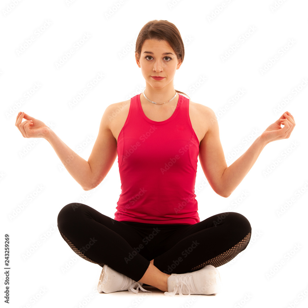 Beautiful young woman meditate in lotus position isolated over white Beautiful young woman meditate in lotus position isolated over white