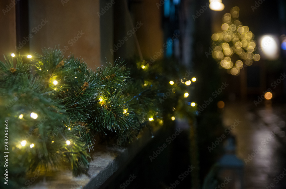 Christmas winter decorations on the window from the outside Christmas winter decorations on the window from the outside