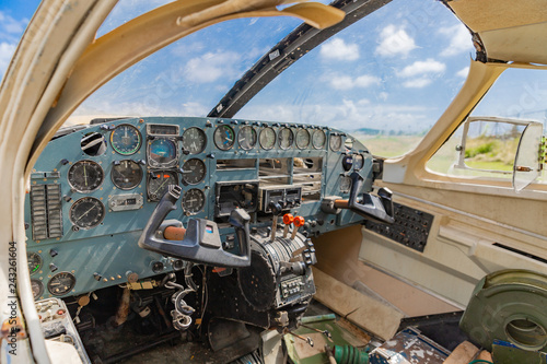 Wrecked and abandoned aircraft cockpit 