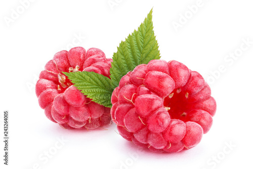 Two ripe raspberries with leaves, isolated on white background
