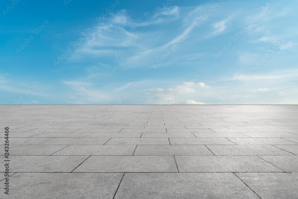 Empty square tiles and beautiful sky scenery Empty square tiles and beautiful sky scenery