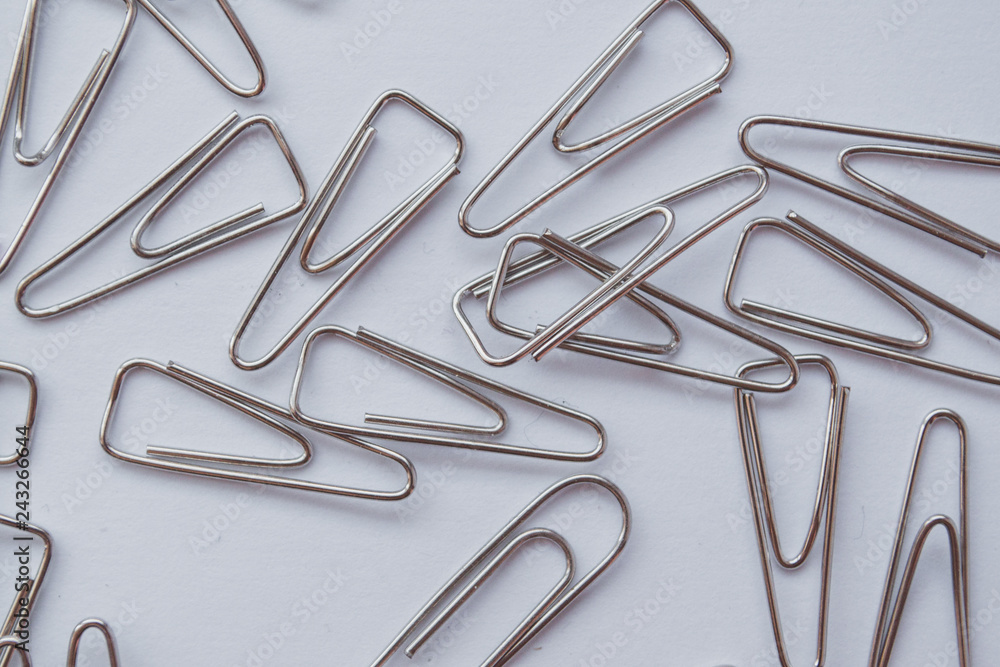 Fototapeta premium Paperclip on the white background.