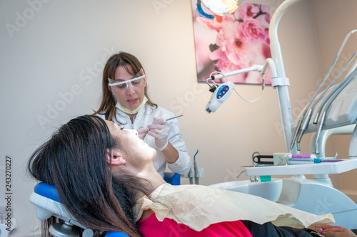 Dentist and patient. Preparation before dental hygiene
