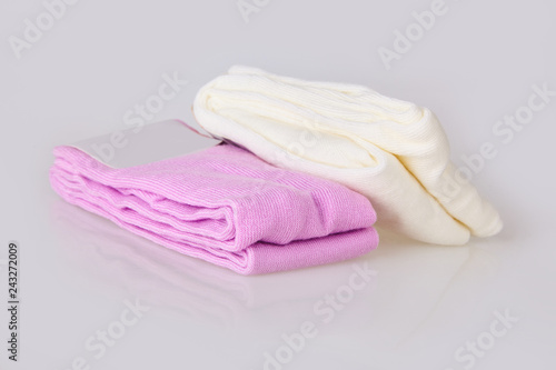 New folded child's tights isolated on white background