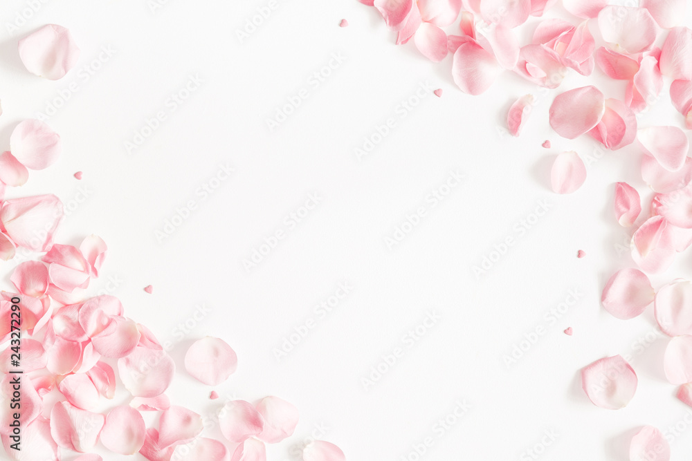 Flowers composition. Rose flower petals on white background. Valentine's Day, Mother's Day concept. Flat lay, top view, copy space