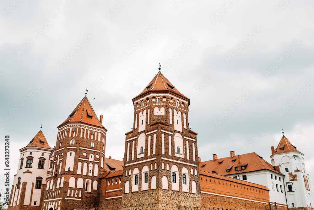 Fototapeta premium ancient castle, brick walls of the old castle, historical building