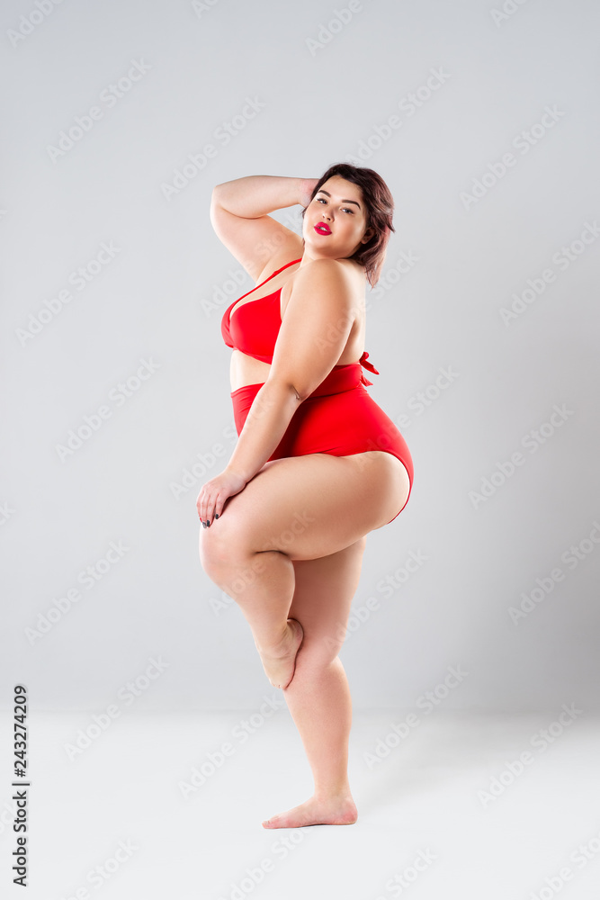 Plus size fashion model in red lingerie, fat woman in underwear on gray  studio background, overweight female body Photos | Adobe Stock