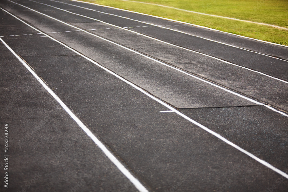 Straight black Running Track  on the athletics stadium.