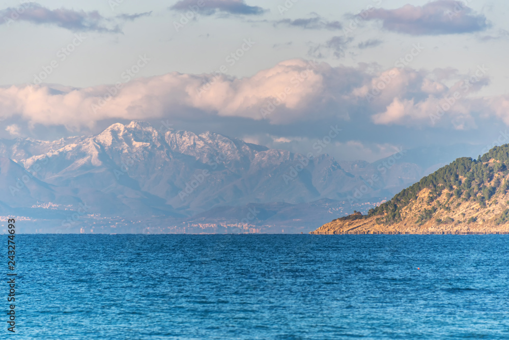 Distant Snow Capped Mountains along the Southern Italian Mediterranean Coast