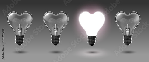 Four transparent heart-shaped bulbs, one of which glows with white light. Highly realistic illustration.