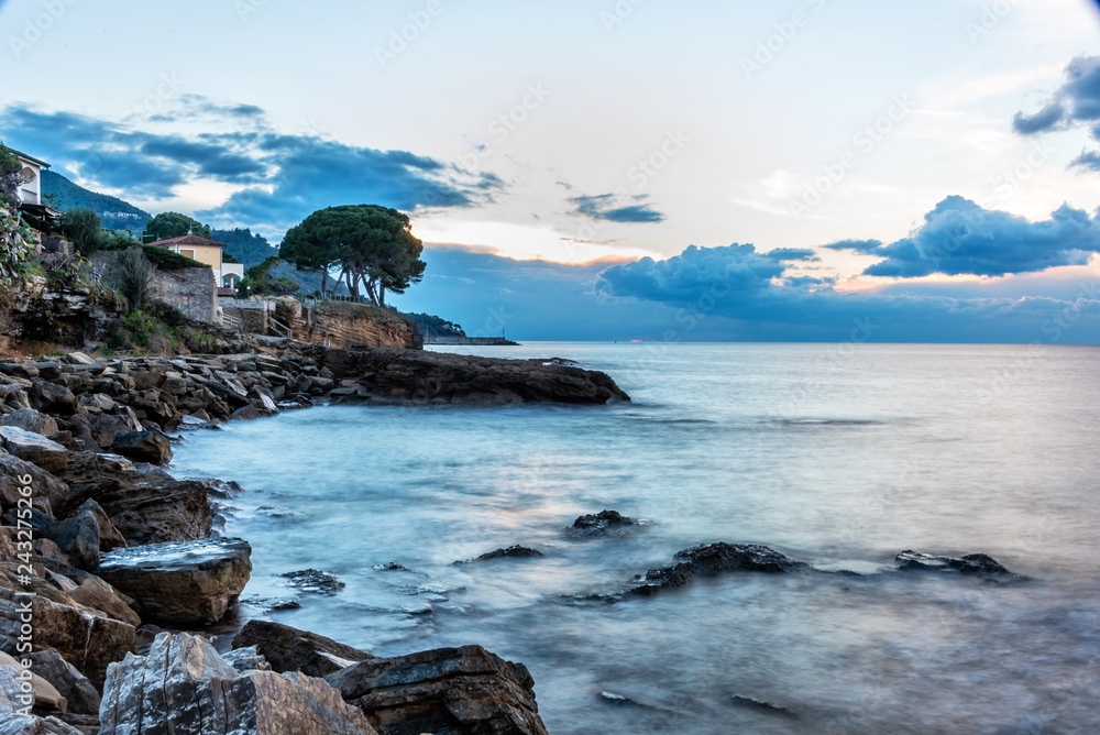 Long Exposure of the Mediterranean Sea Coast with Blue Sky in Southern Italy